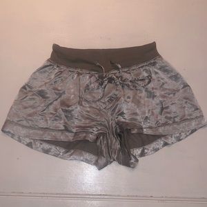 PJ Harlow satin pajama shorts.